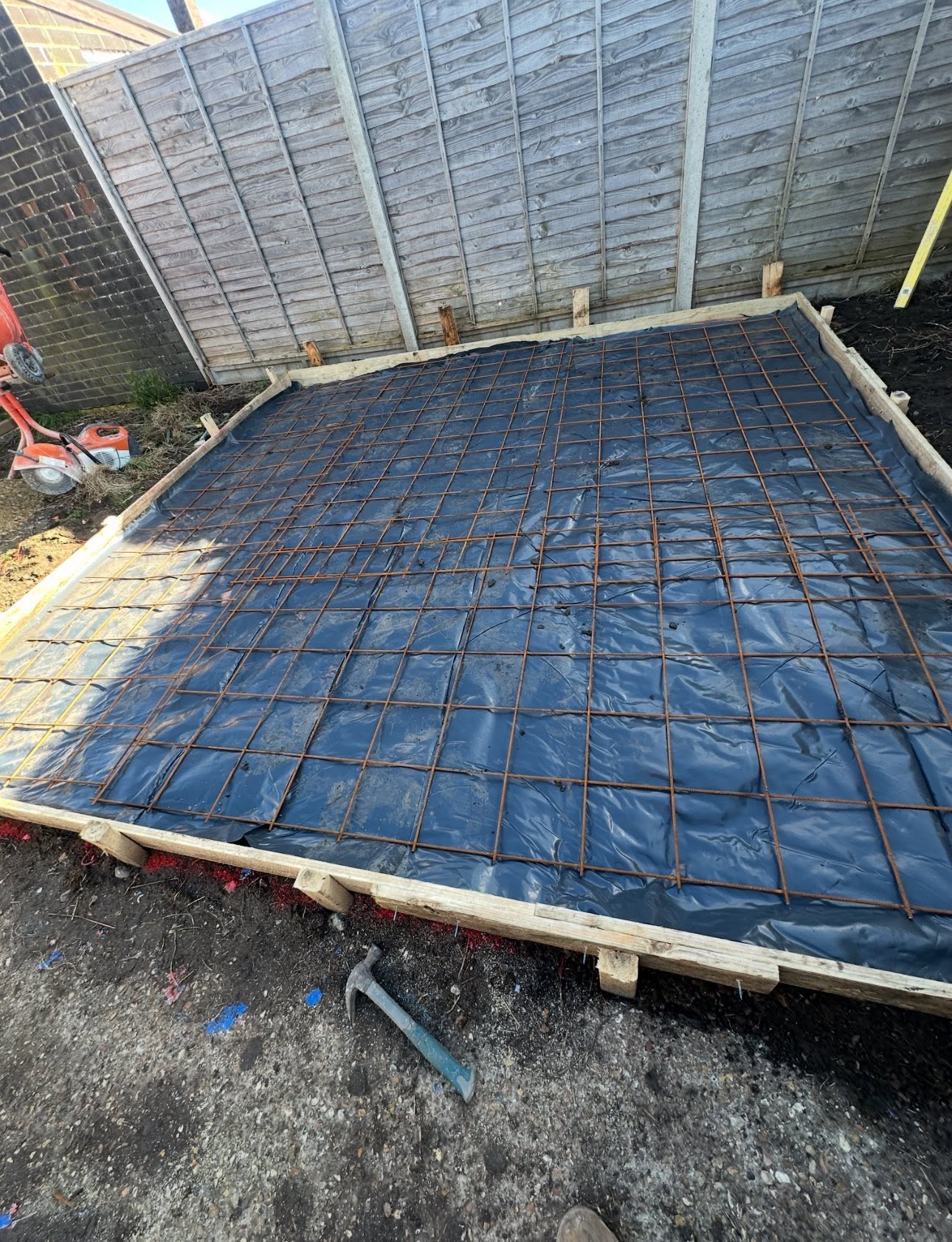 Concrete base preparation with reinforcement